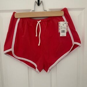 Vibrant Red Athletic Shorts with White Trim